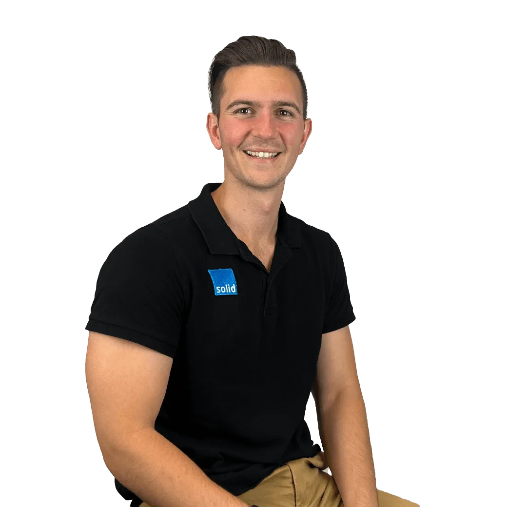 Henrico from the Solid Systems team, smiling in a Solid polo shirt