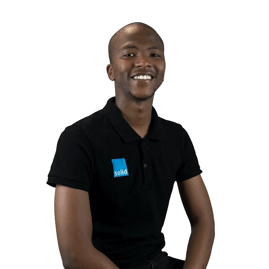 Loyiso from the Solid Systems team, smiling in a Solid polo shirt