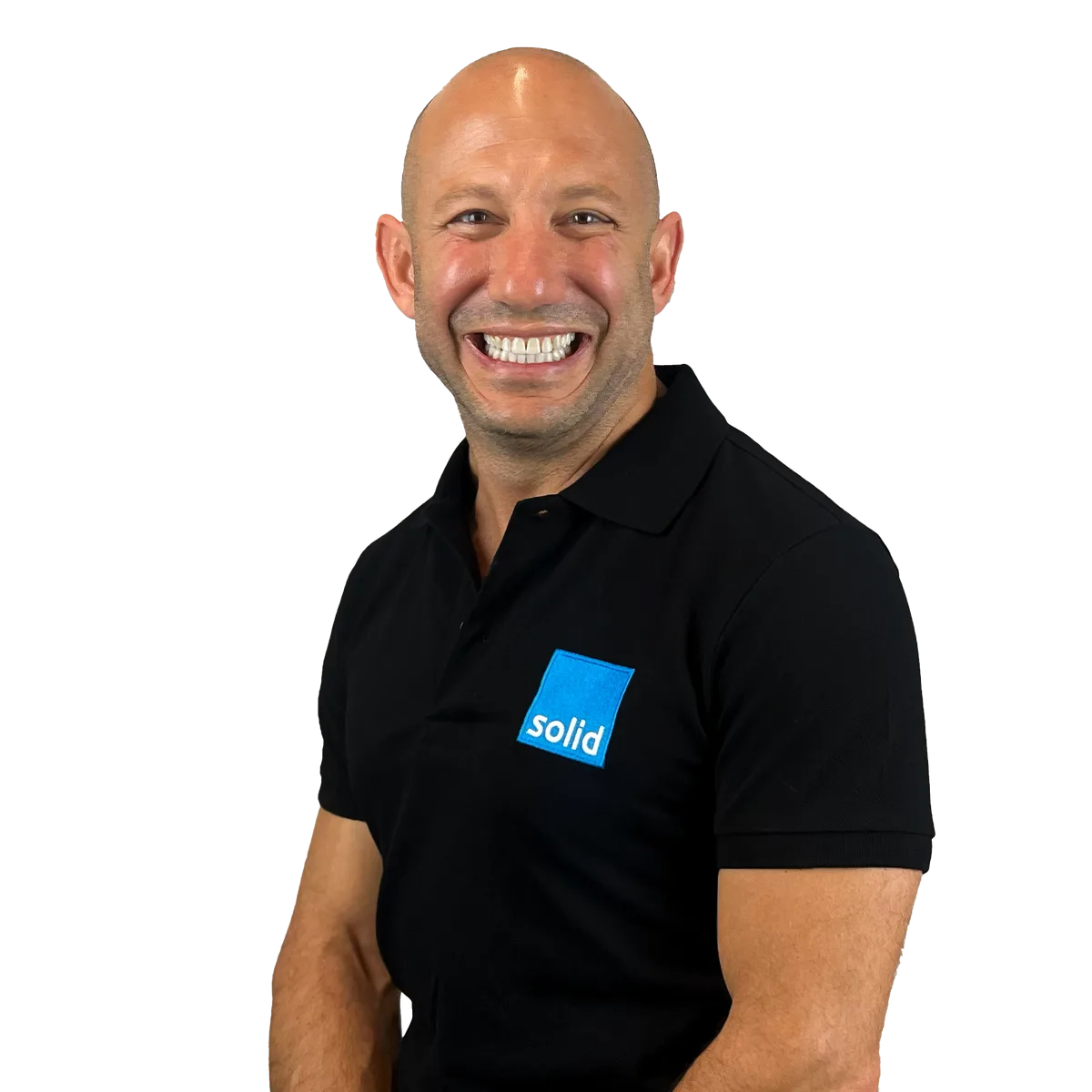 Michael Claxton, co-founder of Solid Systems, smiling in a Solid polo shirt